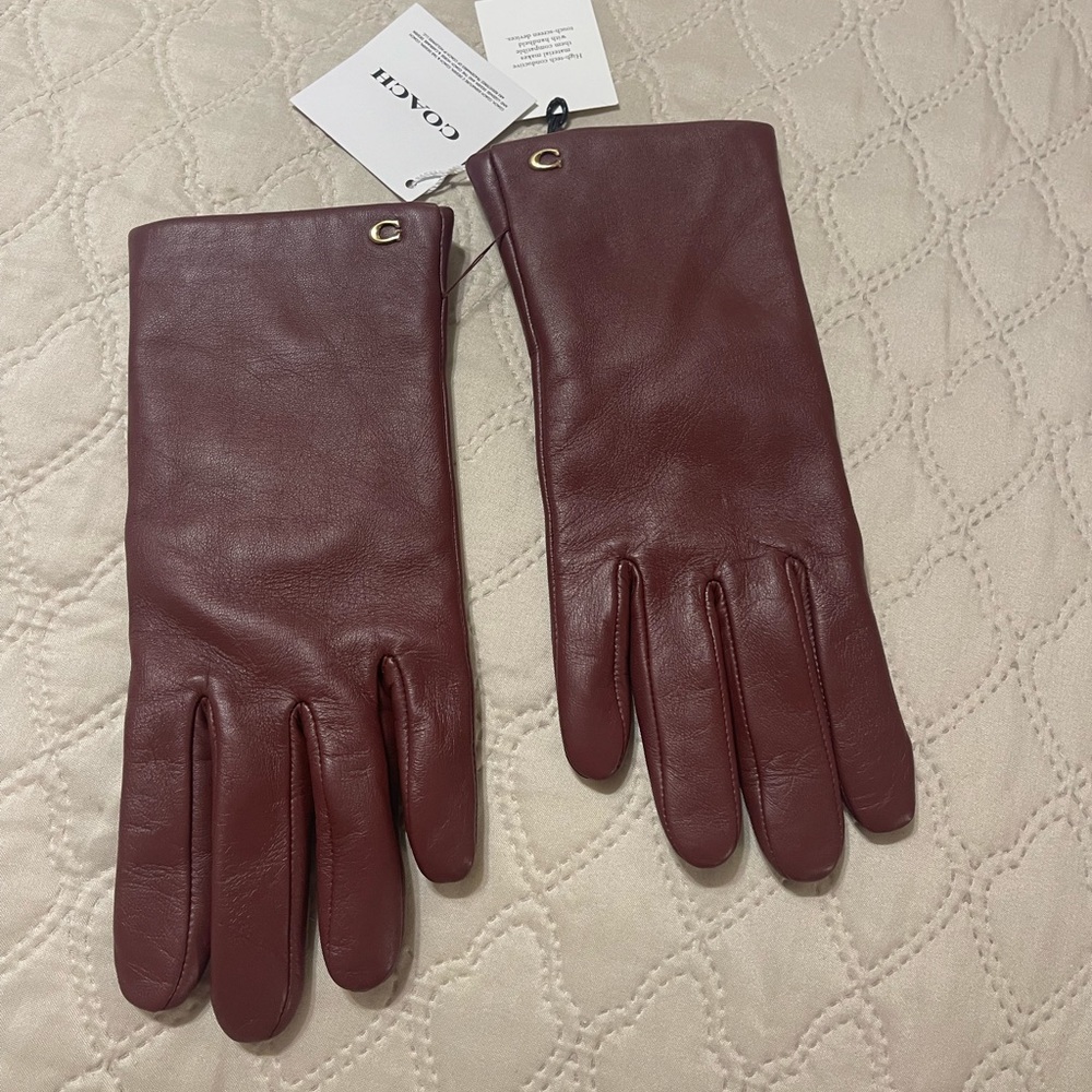 Coach Brand New with Tags. Wine leather gloves , size 7